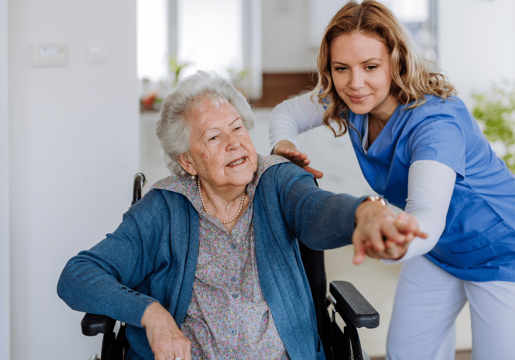 shoulder in home physiotherapy with elder in calgary
